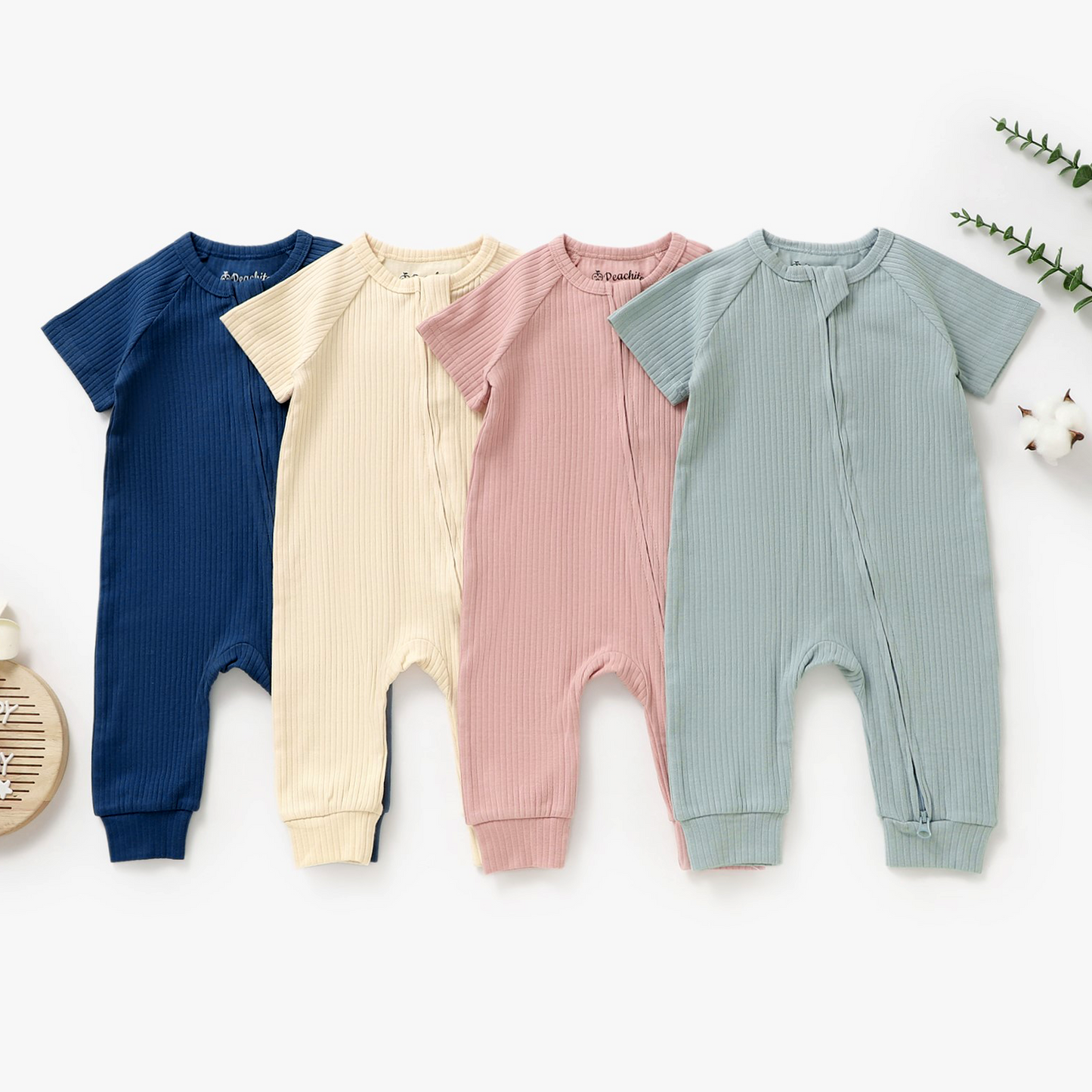 אוברול שרוול קצר עם רוכסן דו כיווני מכותנה אורגנית Blush