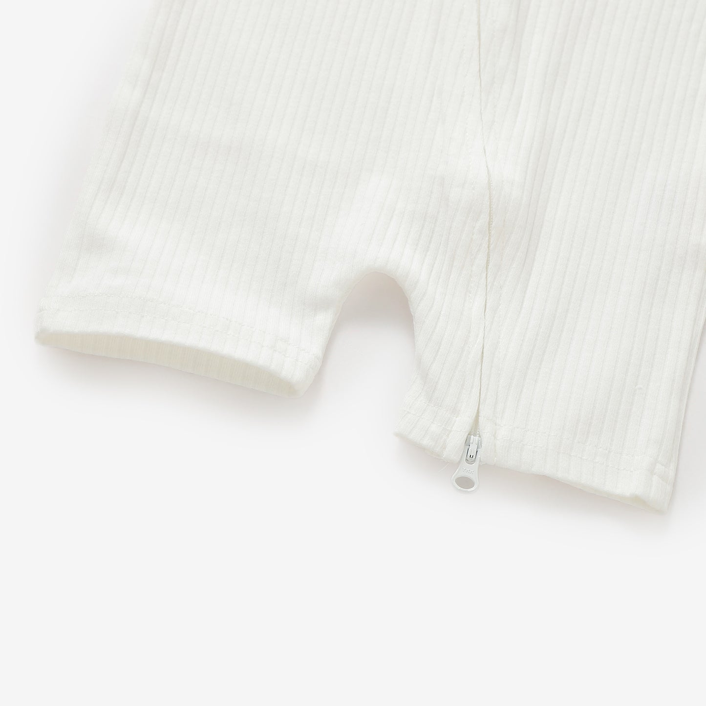 אוברול קצר עם רוכסן דו כיווני מכותנה אורגנית Snow