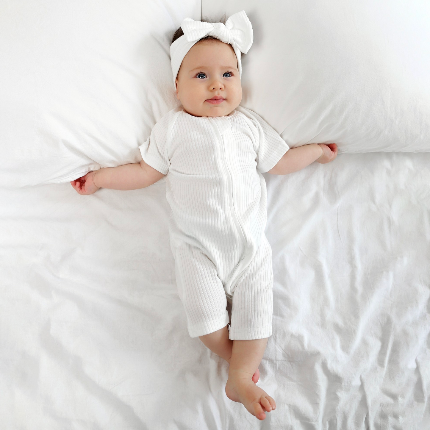 אוברול קצר עם רוכסן דו כיווני מכותנה אורגנית Snow