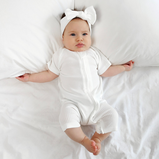 אוברול קצר עם רוכסן דו כיווני מכותנה אורגנית Snow